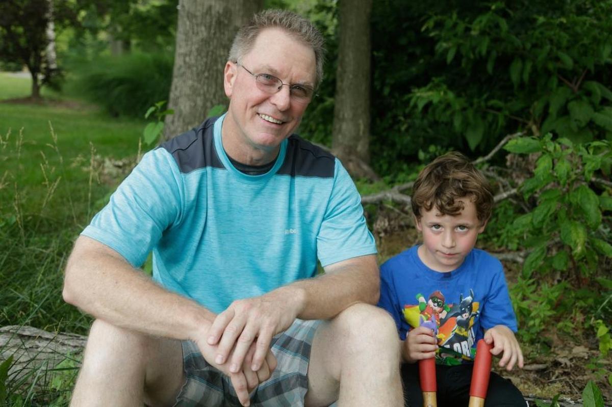 Dean Cravens, left, and his neighbor, Brian Kelly