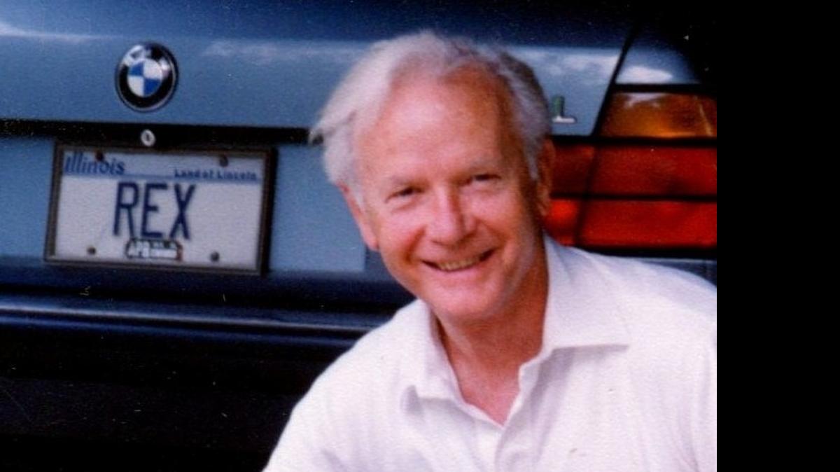 
Prominent Belleville lawyer Rex Carr with his Rex car.
