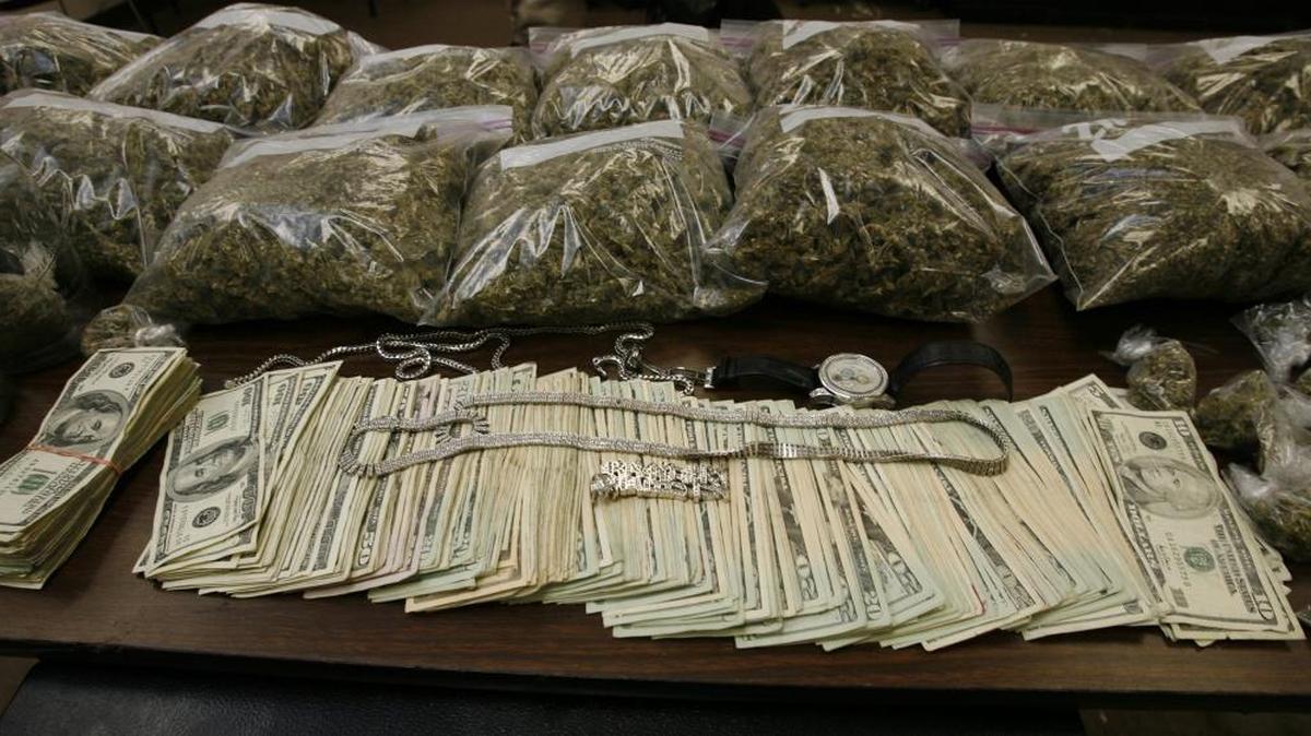 Illinois State Police seized 1.25 tons of drugs in 2017. This 2007 file photo shows drugs seized from an East St. Louis raid.