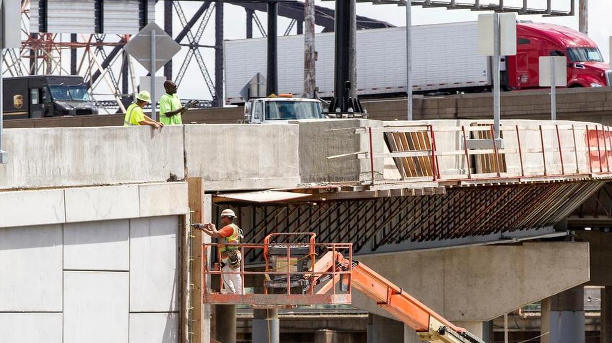 
Beginning Thursday, the Missouri Department of Transportation plans to close the westbound ramp from the Poplar Street Bridge to southbound I-55 and westbound I-44 for a month, where the red truck is in the background. Beginning Monday, drivers will be able to exit off of the Poplar Street Bridge to go east on I-44, where the workers are finishing the ramp. Motorists also will be able to exit off of I-44 east at Washington Avenue, and make a U-turn to merge onto westbound I-44.
