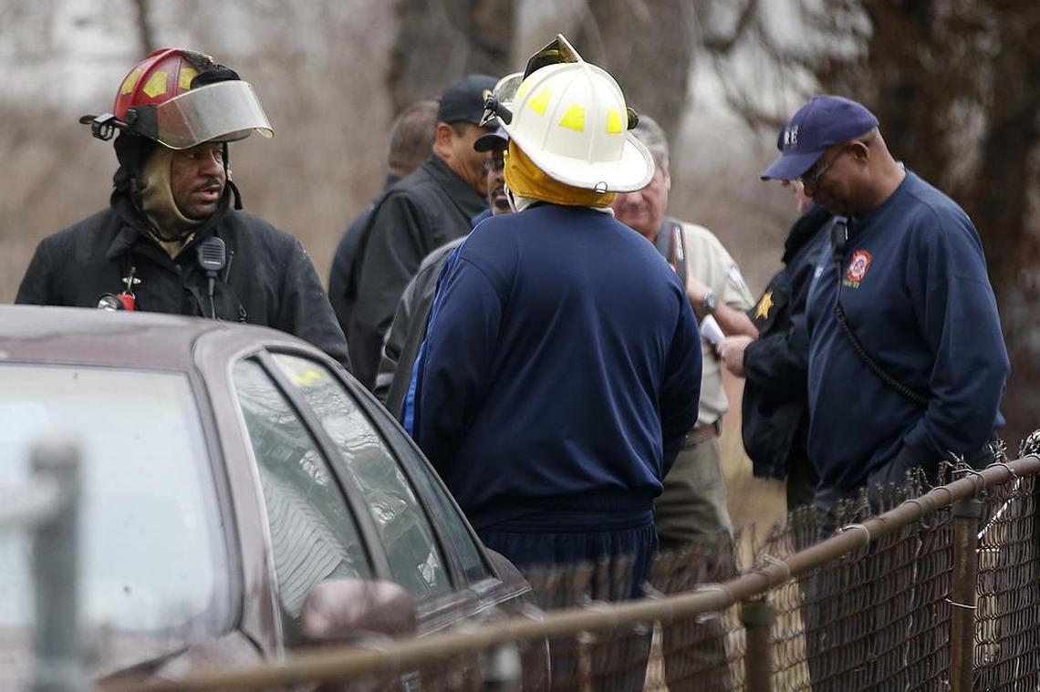 Firefighters and emergency personnel at the scene of the fatal house fire Tuesday at 2141 Market Ave. in East St. Louis