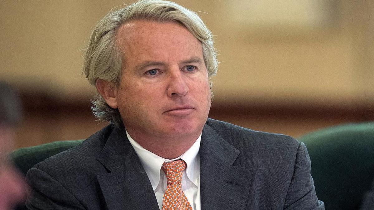 In this Sept. 11, 2014, file photo, University of Illinois Board of Trustees Chairman Chris Kennedy listens during a trustees meeting in Urbana. Hanah Jubeh, a Kennedy campaign adviser, said Wednesday that the businessman and the son of the late U.S. senator and Attorney General Robert Kennedy, will run for Illinois governor in 2018.