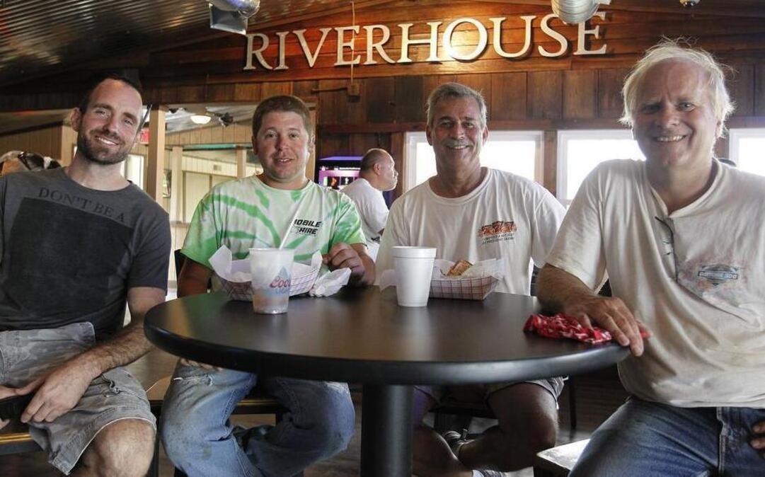 The Kaskaskia Riverhouse, at 1 Harbor Point Drive, said on its website and Facebook page that it closed shortly before the new year. From left: Eric Oetjen, manager; Steve Wagner, close friend and helped with renovation; Jeff Stahl, co-owner; and Stan Sirtak, co-owner.