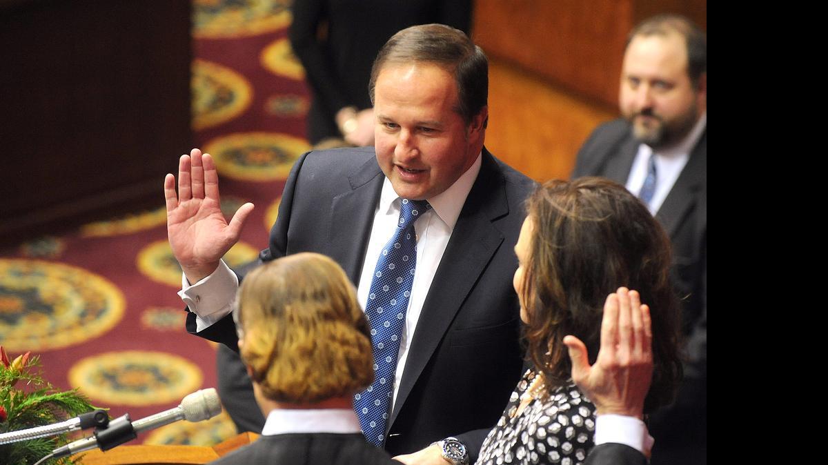 
In this Jan. 7 file photo, John J. Diehl Jr is sworn in as the Speaker Pro Tem of the House of Representatives during the opening of the Missouri legislature in Jefferson City, Mo. Diehl apologized Wednesday for his “poor judgment” following a newspaper report that he had exchanged sexually charged text messages with a college student who was serving as a Capitol intern. 
