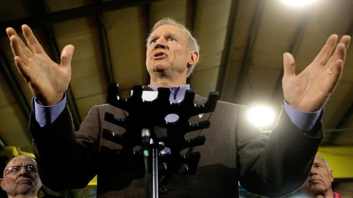 In this May 19, 2016 file photo, Illinois Gov. Bruce Rauner speaks to reporters in Springfield. The politically heightened atmosphere of Springfield this year is a major reason Illinois doesn’t have a state budget nearly 11 months into the fiscal year. It’s also why there likely won’t be a deal for next year before lawmakers adjourn their spring session on Tuesday, May 31, 2016. Both sides are acting with a constant eye on the November election, and whether Republicans can deflate House Speaker Michael Madigan’s Democratic ranks.