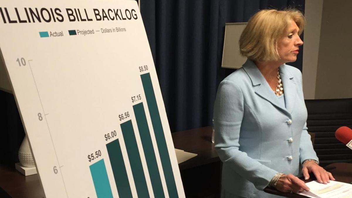 In this Sept. 23, 2015, file photo, Comptroller Leslie Munger holds a news conference in Edwardsville.