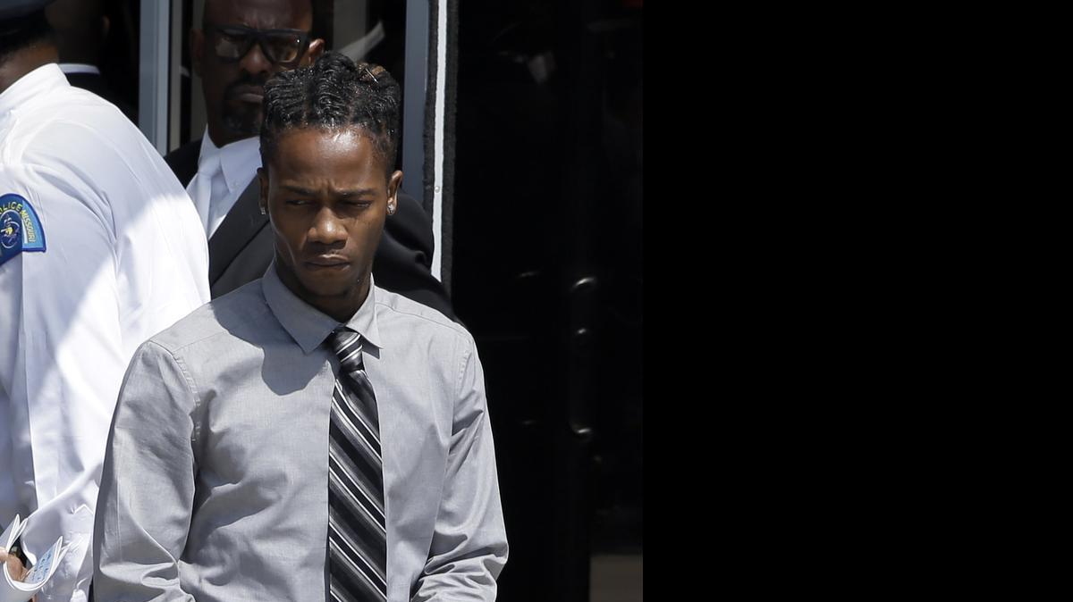 
In this Aug. 25, 2014, file photo, Dorian Johnson leaves Friendly Temple Missionary Baptist Church at the end of the funeral service for his friend, Michael Brown in St. Louis. Johnson, who was with Michael Brown when Brown was fatally shot by a Ferguson police officer last year, is charged with misdemeanor resisting arrest over a new confrontation with police.
