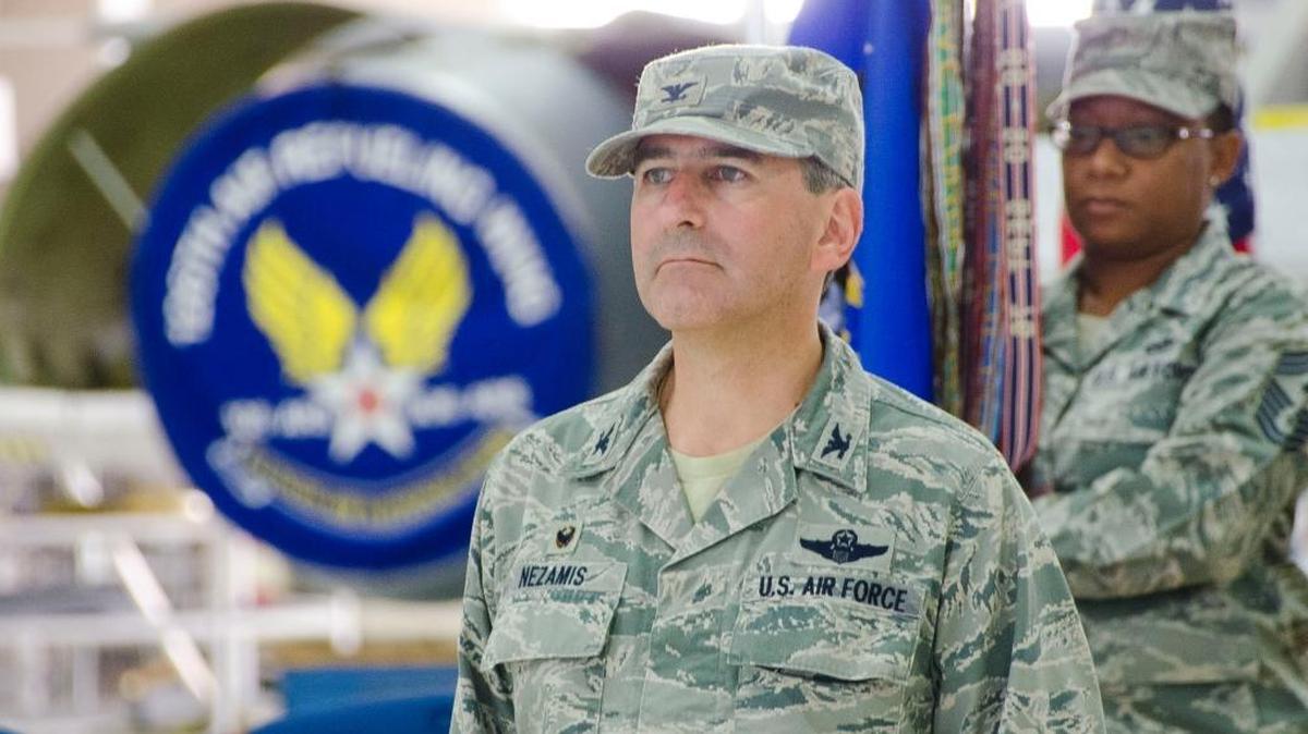 126th Air Refueling Wing commander Col. Peter Nezamis accepts the Air Force Oustanding Unit Award on behalf of the 126th Air Refueling Wing at Scott Air Force Base.