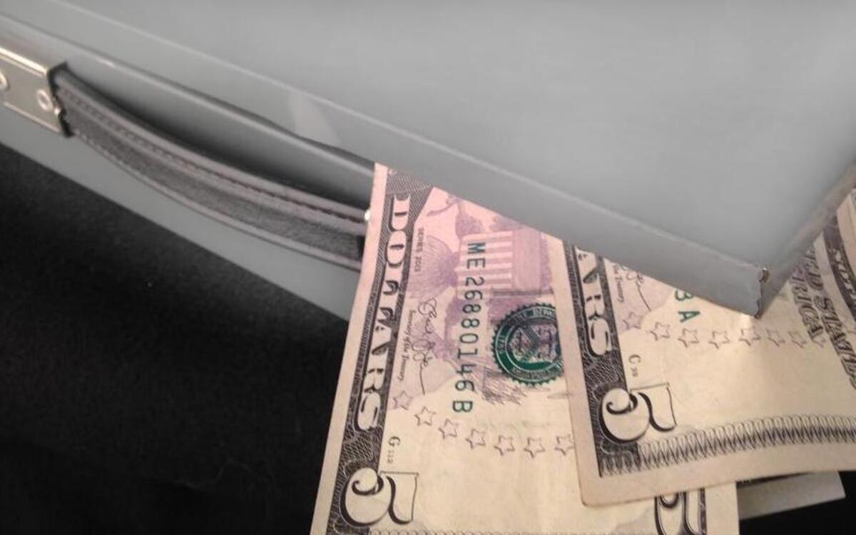Silver suitcases of cash heading to a polling place near you? Report fraud and vote buying at 618-825-2366.