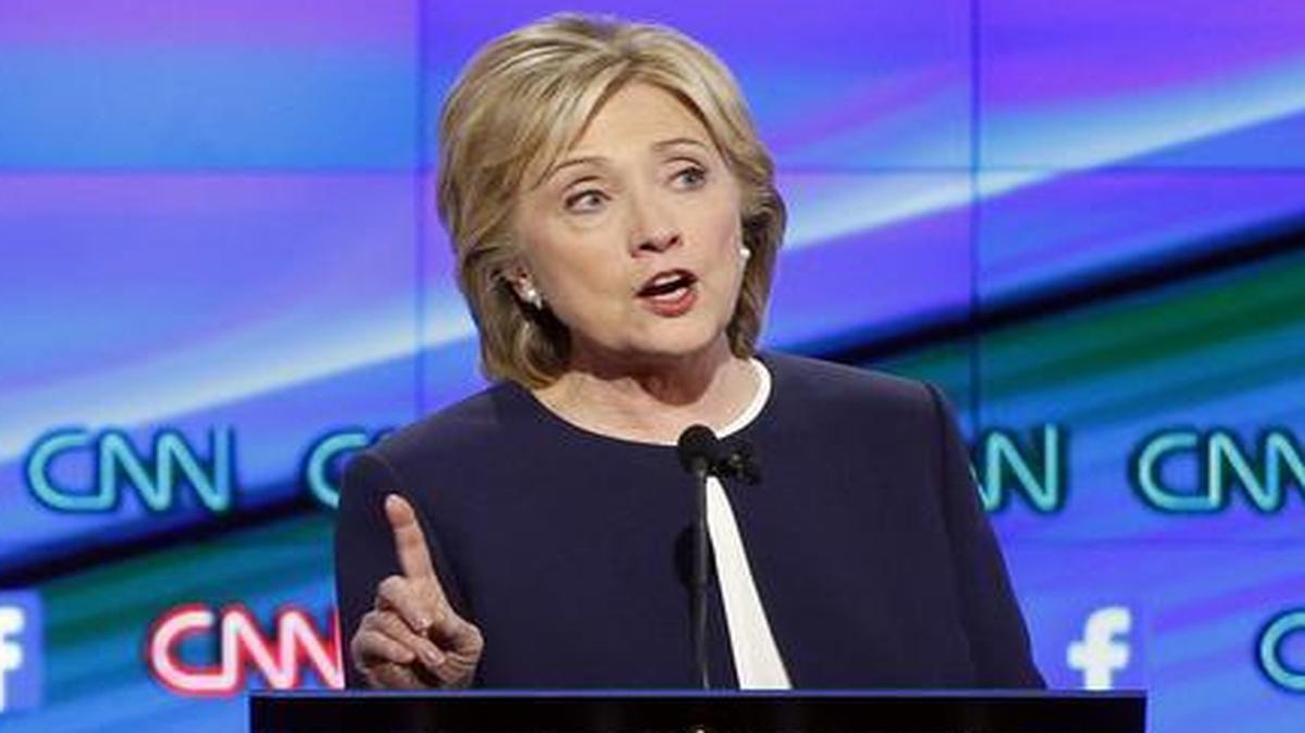 
Hillary Rodham Clinton, right, and Sen. Bernie Sanders, of Vermont, speak during the CNN Democratic presidential debate Tuesday.
