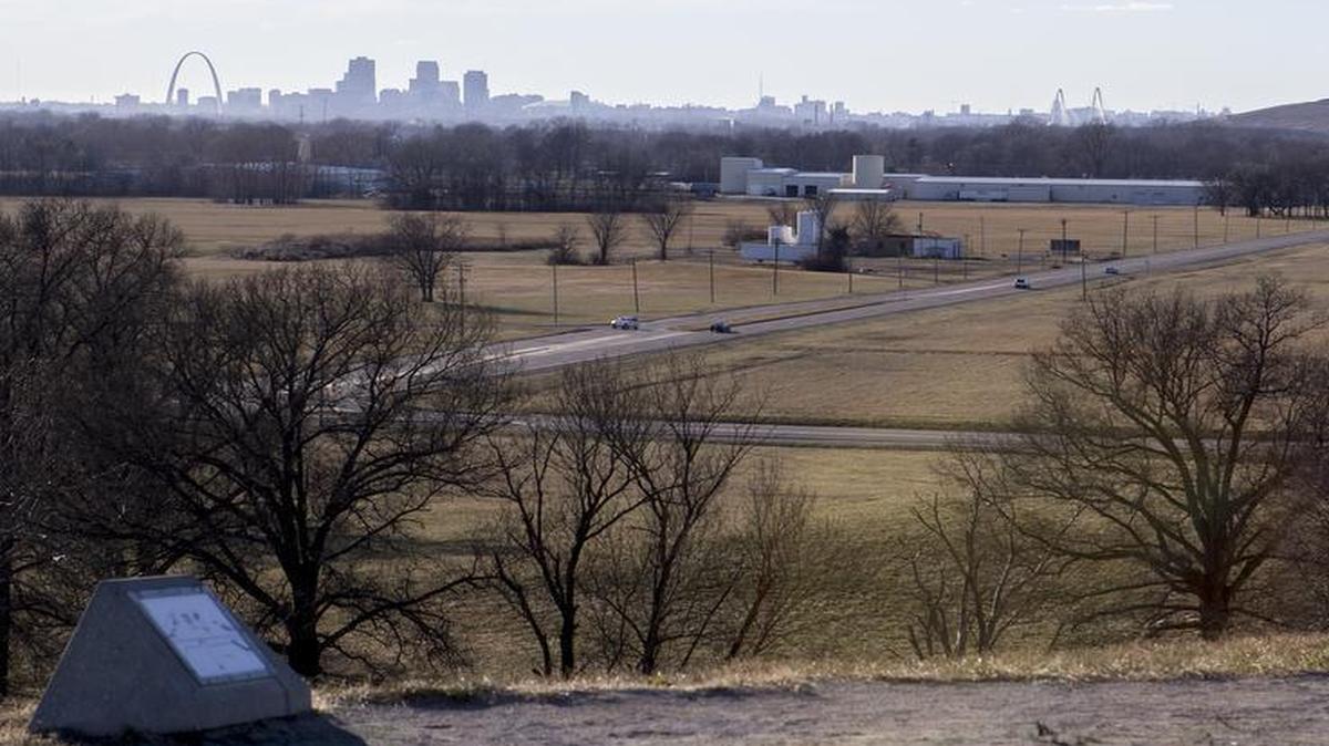 The Gateway Arch is visible from atop Monks Mound at Cahokia Mounds State Historic Site. The Arch draws 4 million visitors a year, but only 280,000 visited Cahokia Mounds last year even though it is a World Heritage Site.