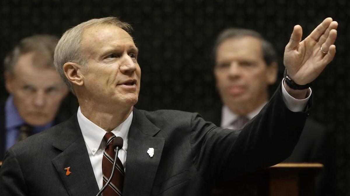 Illinois Gov. Bruce Rauner delivers his annual budget address to a joint session of the General Assembly in the House chambers at the Capitol on Wednesday in Springfield.