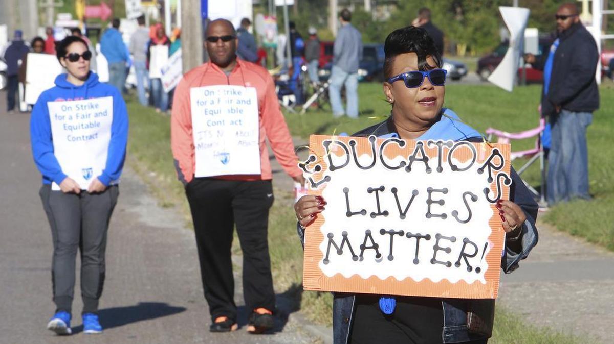 
East St. Louis teacher Debra Humphrey-Morgan, coordinator of Career & Technical Education walks the picket line Friday. She made $82,814 last year and has about 25 years of experience.

