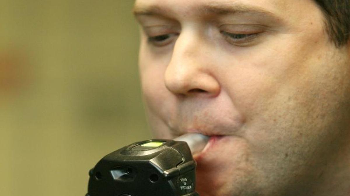 
Michael Albert with Guardian Interlock demonstrates the company’s alcohol monitor system and ignition interlock device.

