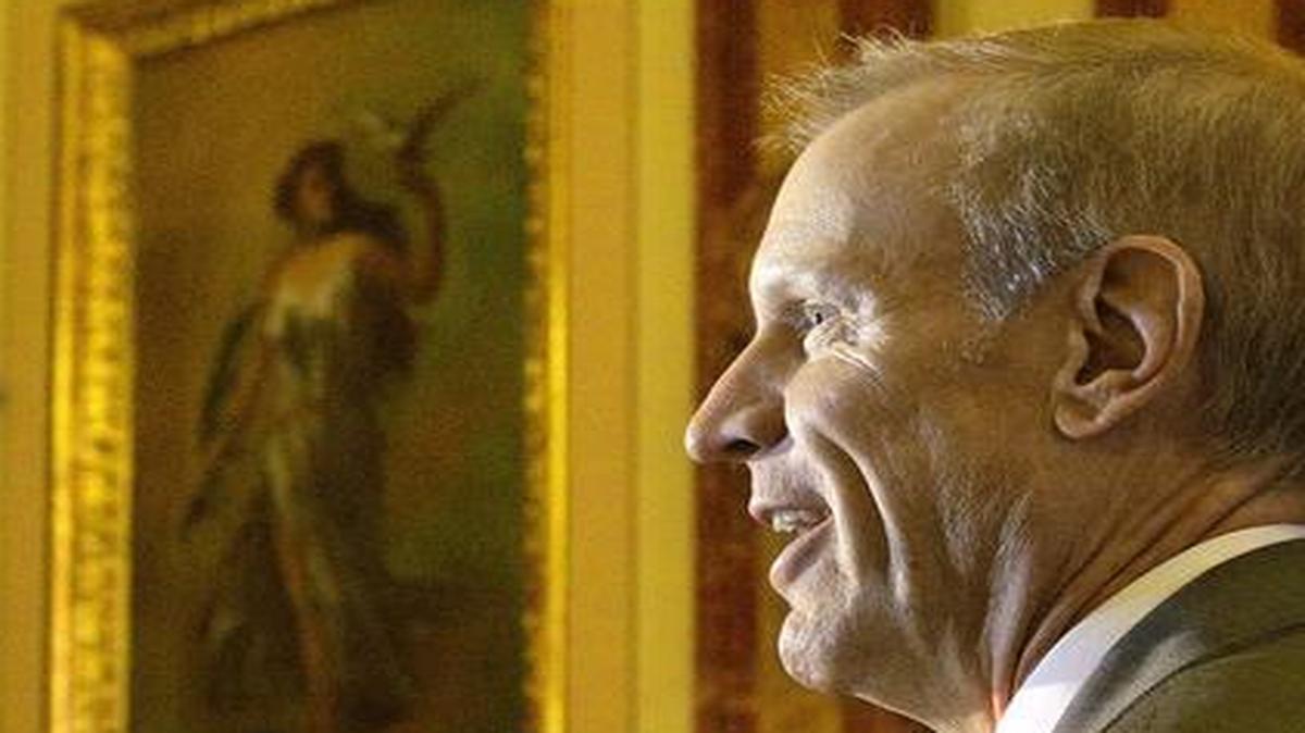 Illinois Gov. Bruce Rauner, a Republican, compromised with legislative Democrats to free up already collected tax revenue owed to local governments even as icy relations continue between the two sides.
