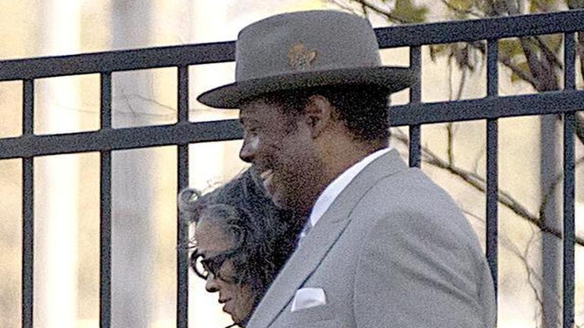Former East St. Louis Township supervisor Oliver Hamilton flashes a smile after he pleaded guilty Dec. 1 to federal wire fraud charges in U.S. District Court in East St. Louis. His sentencing hearing is Thursday.