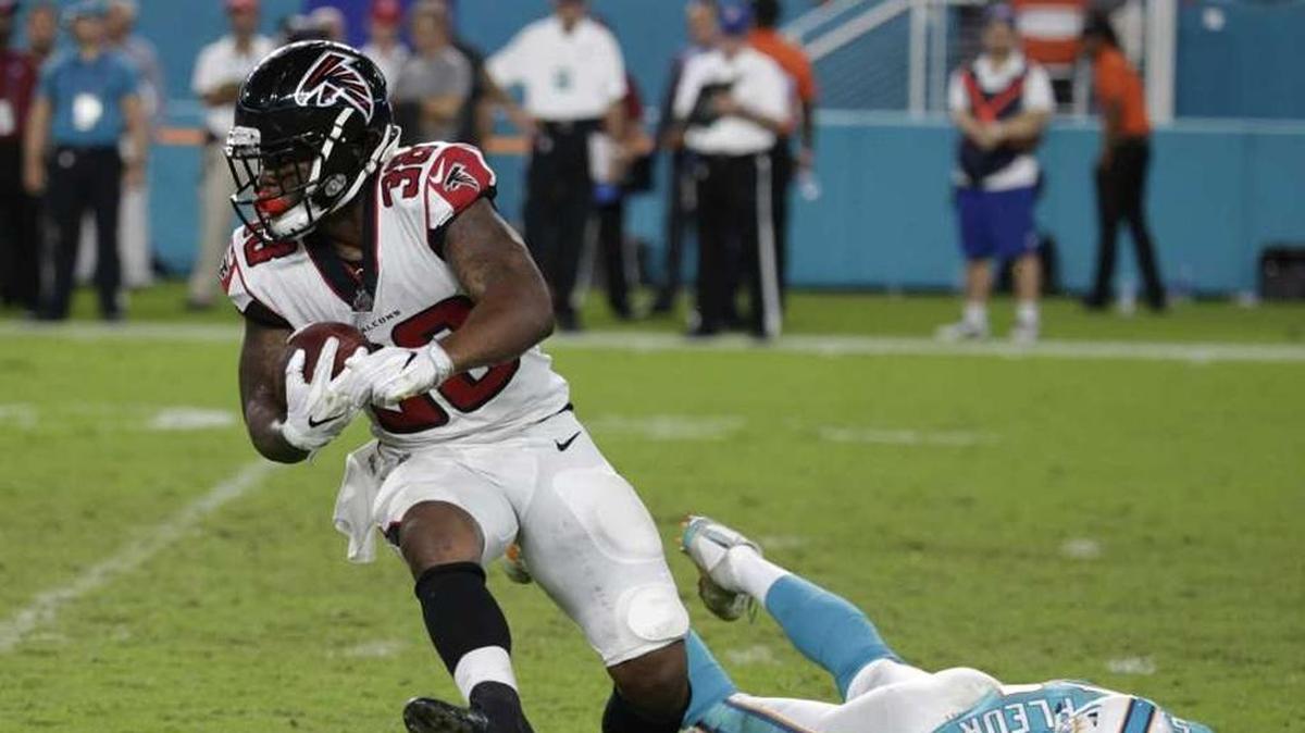 Brian Hill, a former Belleville West standout, carries the ball for the Atlanta Falcons in 2017. The St. Louis Battlehawks of the XFL recently selected Hill as one of their draft picks.
