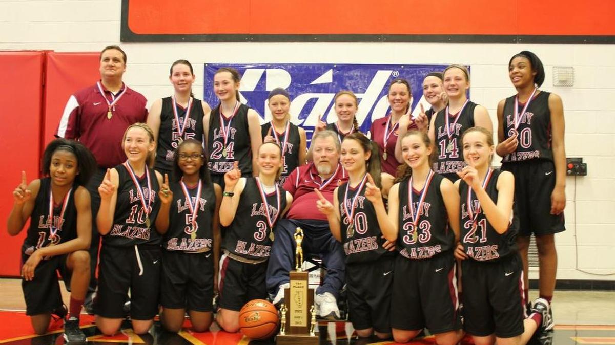 Greg Craft (center) with his Collinsville Middle School state-champion eighth-grade team in 2013.
