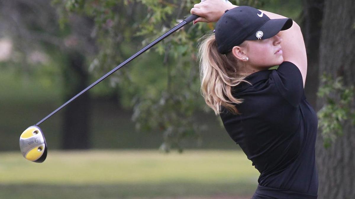 
Collinsville's Abbey Burns watches her drive during the Class AA Girls Golf Regional at Tamarack Golf Course in Shiloh on Wednesday morning. 
