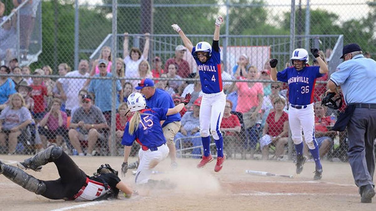 Nashville players celebrate the winning run over Fairfield in the first round of the IHSA Class 2A state tournament. The win propelled the Hornets to the second title of coach Dempsey Witte’s career.