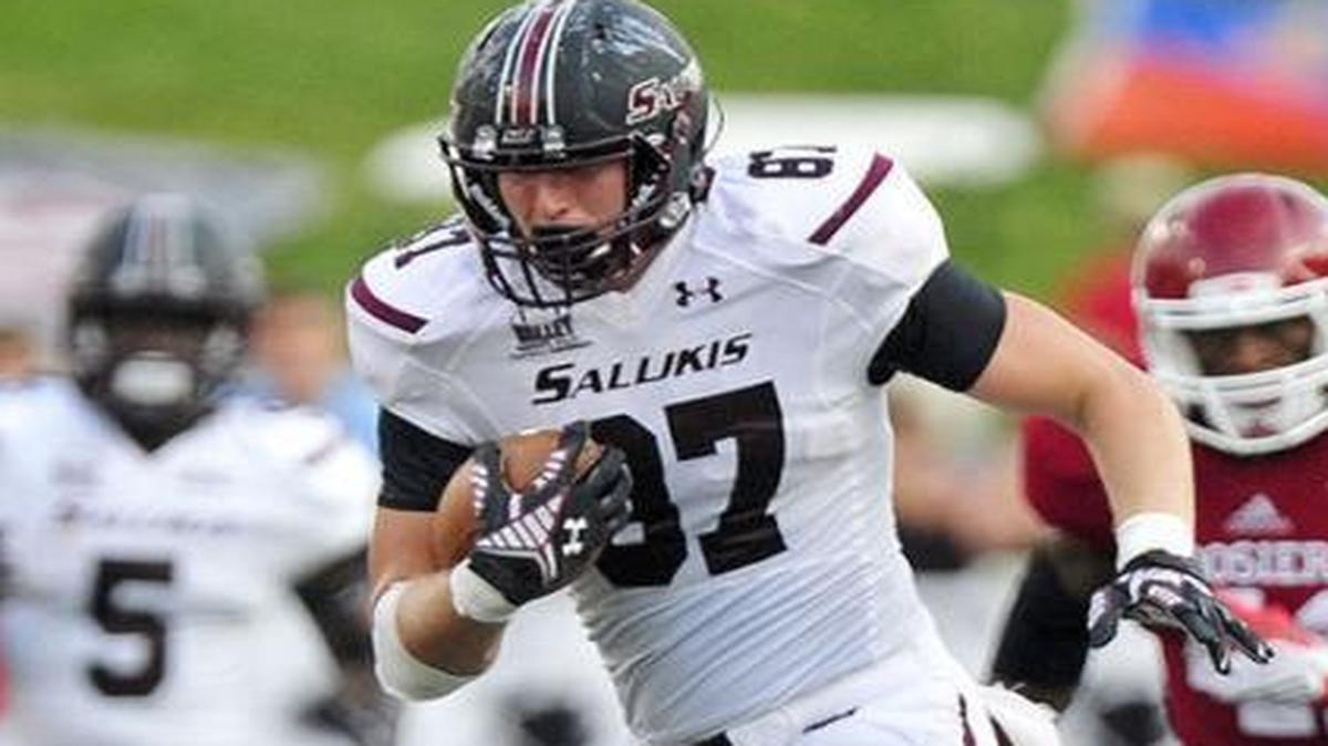 At 6-foot-8 and 260-pounds, Damiensville native Adam Fuehne is believed by some to have the size and hands to make the transition from Southern Illinois University to the NFL. Fuehne played high school football at Mater Dei.