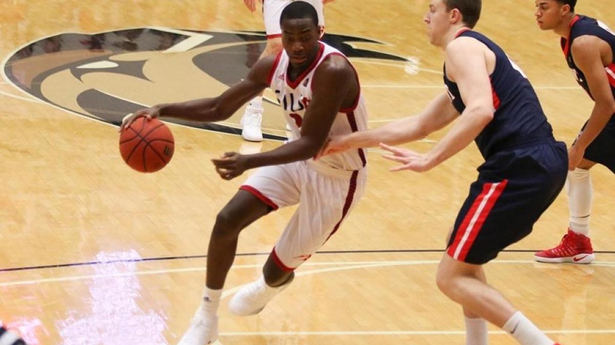 SIUE junior Daniel Kinchen drives to the basket in a loss to Belmont at Vadalabene Center Thursday.
