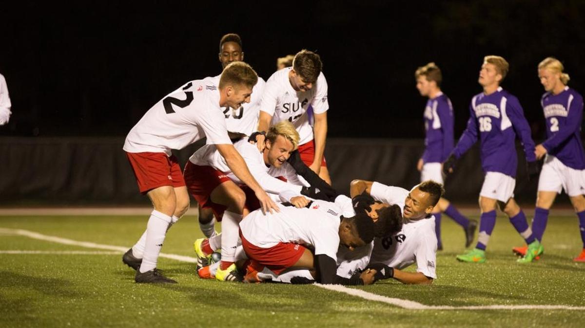 The SIUE Cougars are shown celebrating their first Missouri Valley Conference regular season championship last fall. The 2016 men’s soccer schedule has been released.