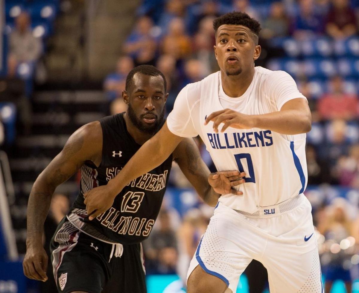 Saint Louis University’s Jordan Goodwin, right, blocks Southern Illinois University Carbondale’s Sean Lloyd Jr. on Wednesday, Dec. 6, 2017, during the Billikens and Salukis’ matchup at Chaifetz Arena in St. Louis, Missouri.