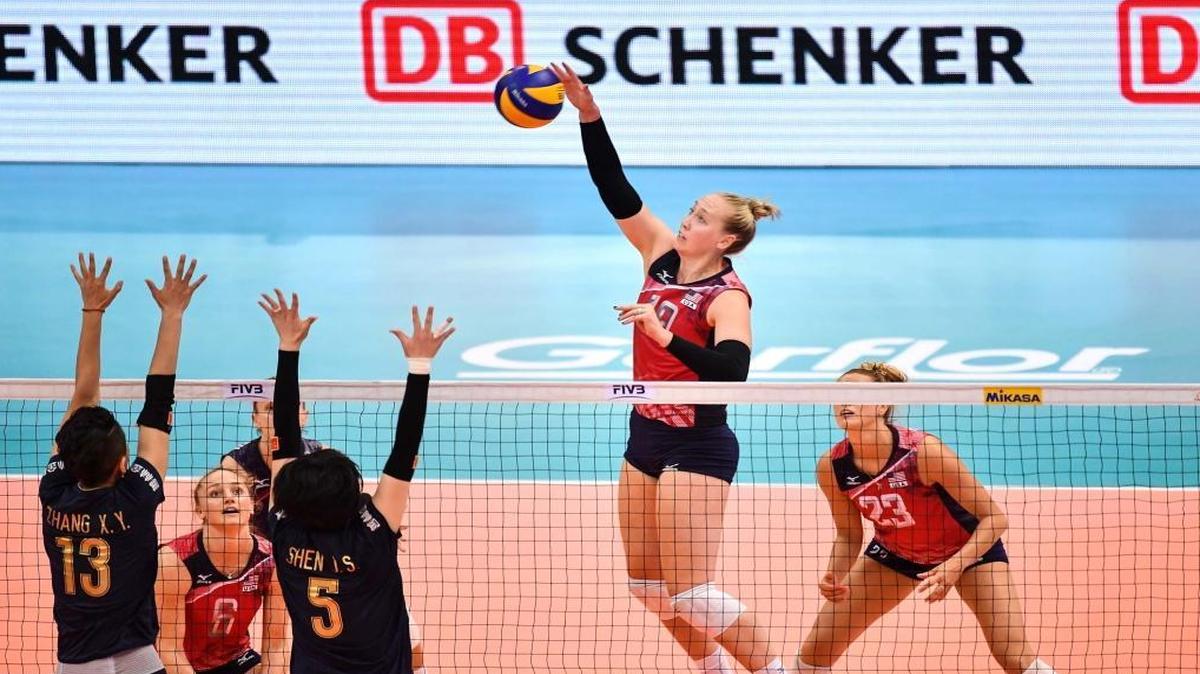 Former Collinsville High and University of Illinois All-American Michelle Bartsch (center) chosen as alternate to Team USA Volleyball team at the upcoming Olympics in Rio de Janeiro.