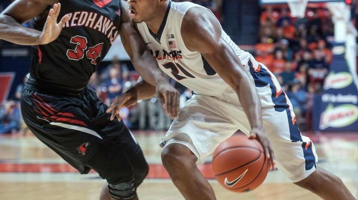 Illinois guard Malcolm Hill, a Belleville East graduate, is fouled by Southeast Missouri guard Denzel Mahoney during the first half in Champaign on Friday.