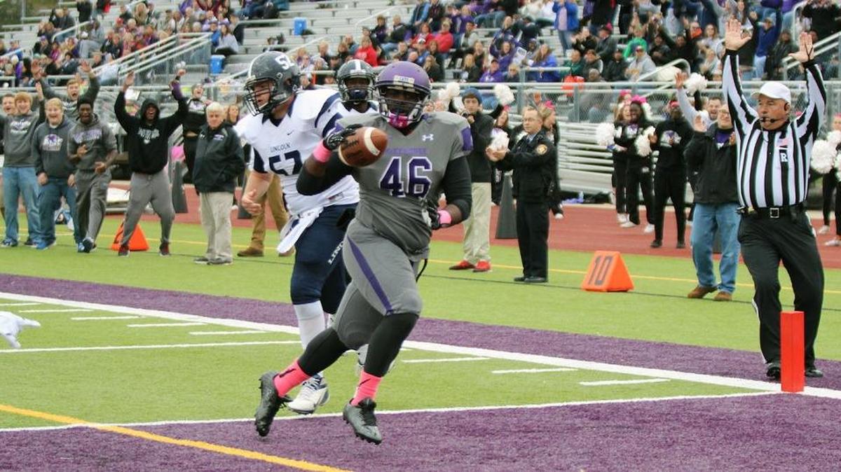 McKendree’s Jeremiah Wilkins crosses the goal line after his 30-yard interception return for a touchdown Saturday against Lincoln.