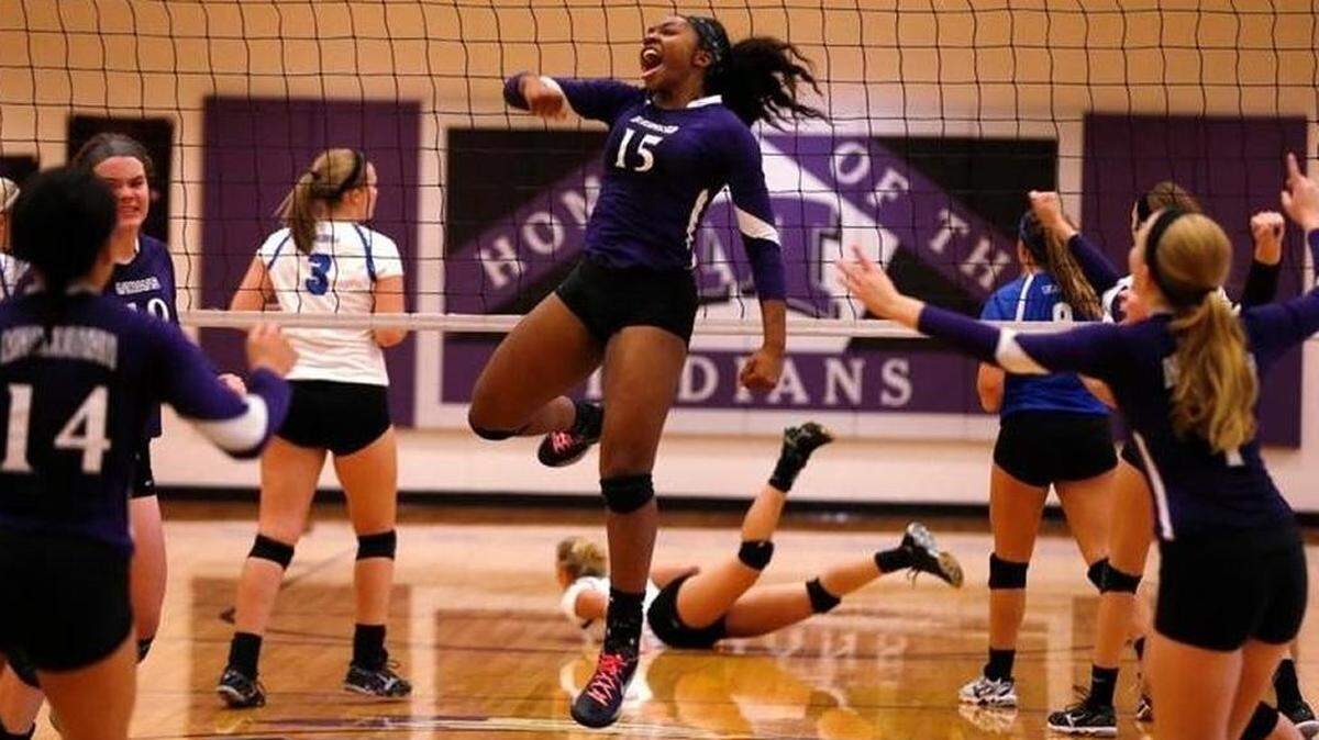 Katriah Johnson, No. 15, celebrates a point as a player for Mascoutah High School last fall. Now a middle hitter at Murray State University, Johnson was named the Ohio Valley Conference Freshman of the Year.