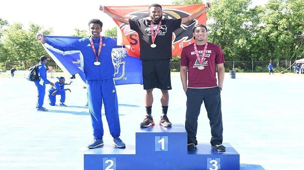 Derek Drew, center, won the Ohio Valley Conference championship in the 400-meter hurdles despite receiving chemotherapy three times a month while he trains. The Oswego, Illinois product will learn if he made the cut for the NCAA Track and Field Meet Thursday.