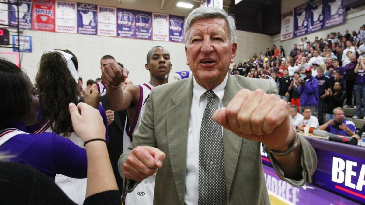 McKendree University men’s basketball head coach Harry Statham, shown celebrating his 1,000th win over East-West University, enters Thursday’s home game against Wisconsin-Parkside with 1,097 career victories at McKendree. Statham is one win shy of the all-time mark for college basketball victories at the four-year level — men’s or women’s, all divisions — which was established by former University of Tennessee women’s coach Pat Summitt.