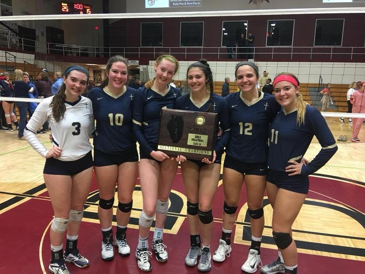 Althoff seniors celebrate the Crusaders’ Class 3A sectional championship. From left: Annika Beal, Leighten Kaiser, Louise Comerford, Katelynn Peterson, Addie Burris and Erica Buckley.