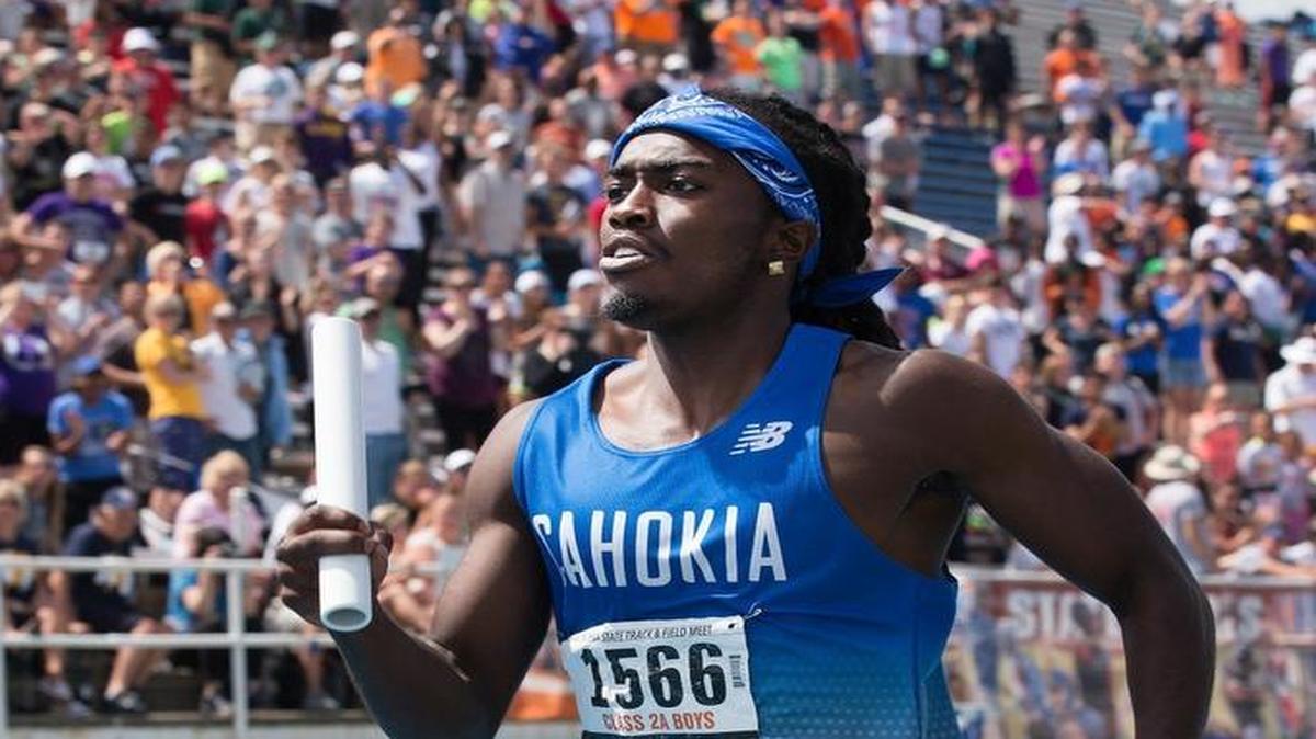 Cahokia’s Tyran Lyons competes in the 400 meter relay championship race at the IHSA Track and Field State meet on Saturday.