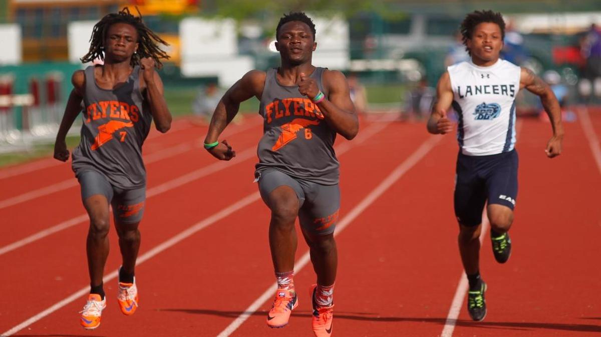 Willie Johnson, center, was one of the favorites to win at the IHSA state track meet before the Flyers announced they wouldn’t participate.