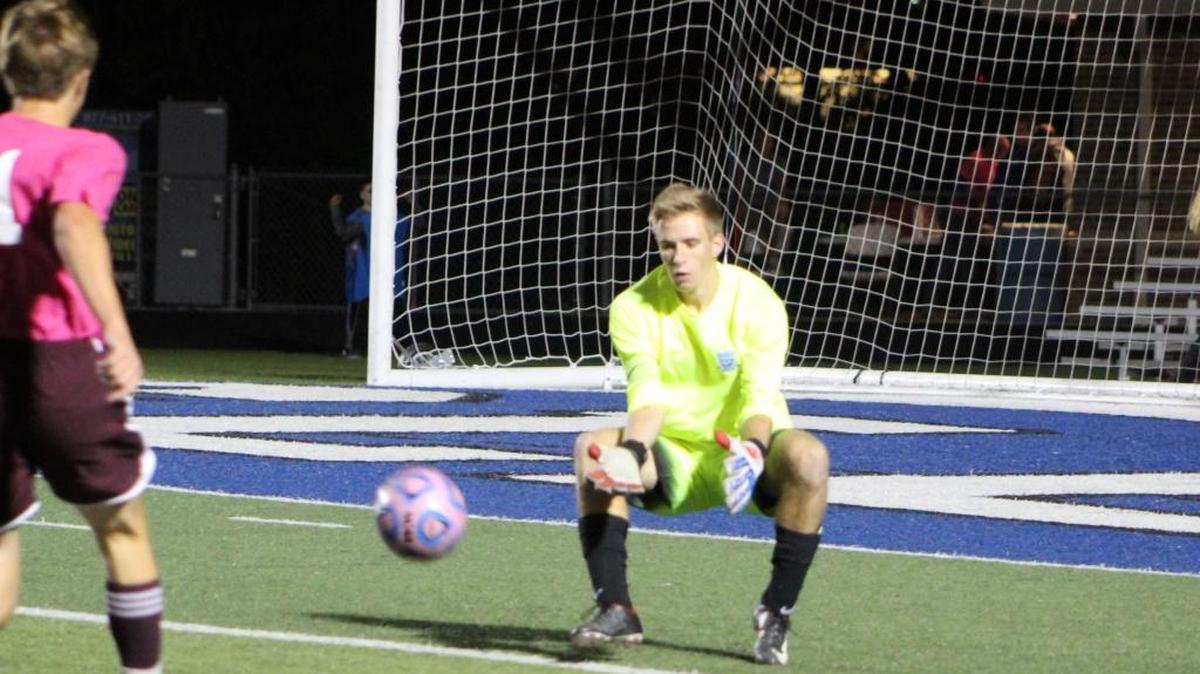 Columbia senior goalie Jon Kuebler stops a shot during the Eagles 3-1 over Belleville West Wednesday. Kuebler’s 1,650 minutes played leads the St. Louis region by far and his .29 goals-against average ranks sixth. He’s tied with Alec Meissner of St. Louis University High School with 12 shutouts.
