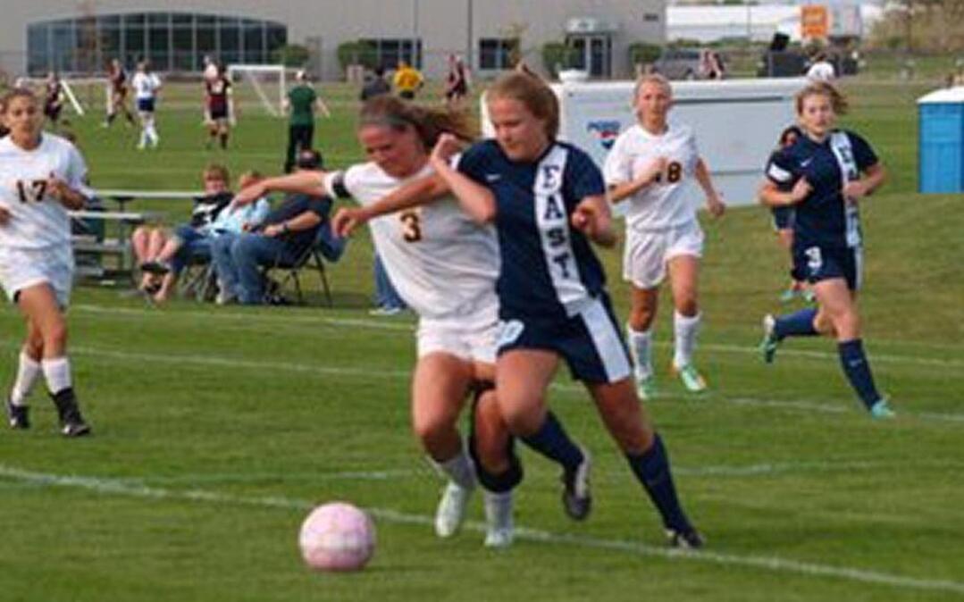 Grace Brauer (right), a senior at Belleville East, is up to her usual goal-scoring exploits for the Lancers.
