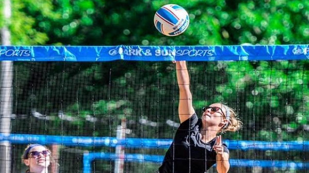 Columbia Eagles senior and Belleville News-Democrat Large-School Volleyball Player of the Year Colene Hamilton (center) earned a sand volleyball scholarship to Division I Central Arkansas.