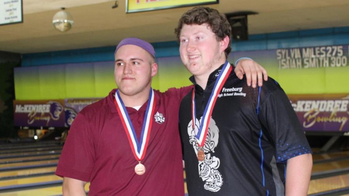 Belleville West senior Sam Watson and Freeburg senior Tyler Hunter pose for photos at the IHSA State Bowling Tournament at St. Clair Bowl in Fairview Heights on Saturday. Watson and Hunter each earned all-state status by placing 12th and 11th, respectively.