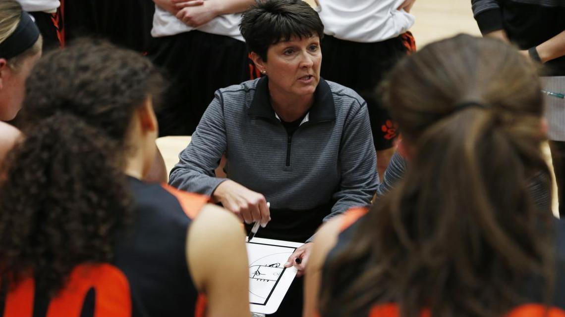 Edwadsville head coach Lori Blade talks to her players during their game against Belleville West.