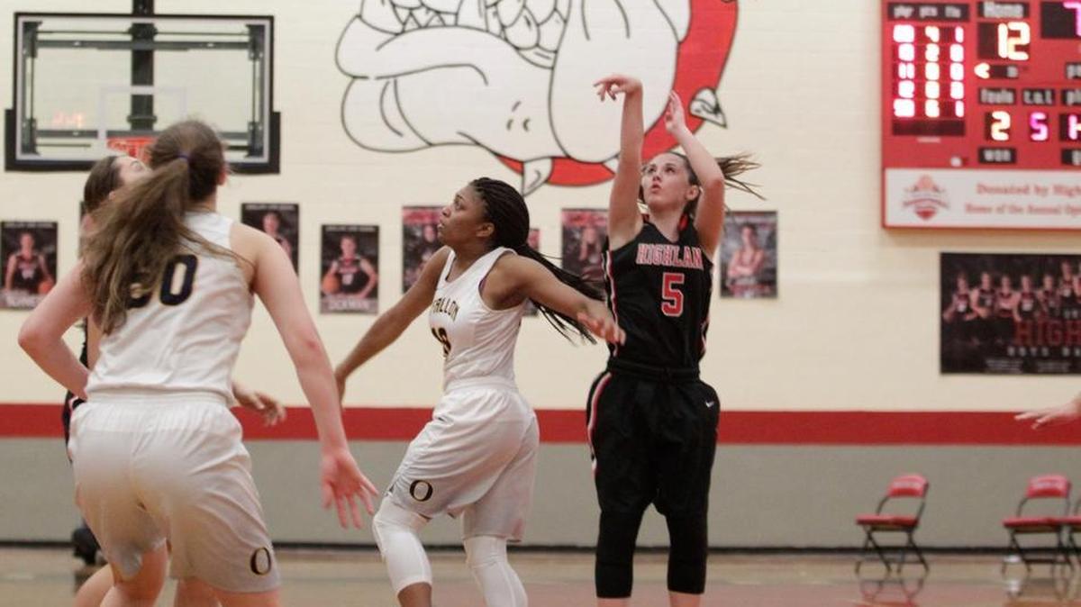 Ellie Brown of Highland pulls up for a jump shot against O’Fallon in the semifinal game of the Highland Girls Tournament.
