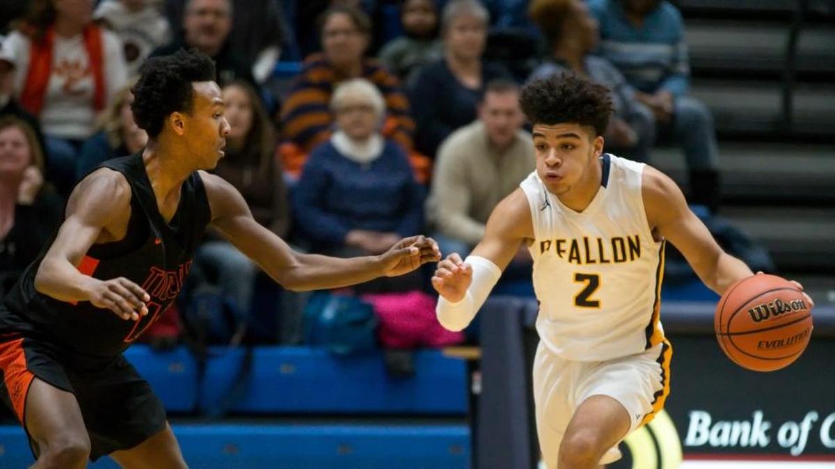 O’Fallon’s Jalen Hodge drives against Edwardsville’s Jaylon Tuggle during Friday’s game at O’Fallon High School.