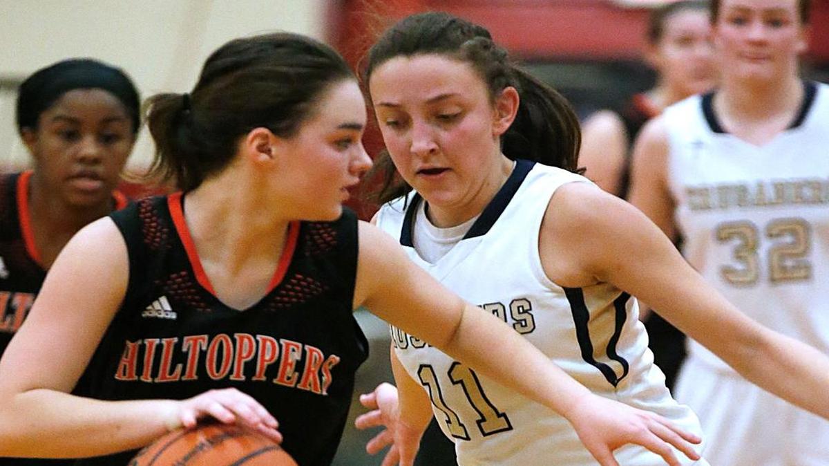 Althoff’s Kyleigh Vaught defends while playing the Hillsboro Hilltoppers Monday at Highland’s 31st annual Scott Credit Union Highland Tournament at Highland High School.