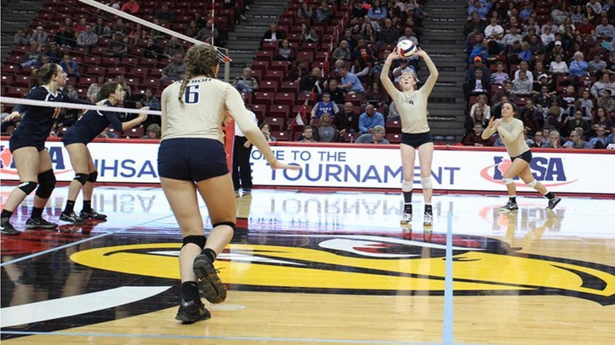 Althoff junior setter and BND Small-School Volleyball Player of the Year Louise Comerford gets ready to set a teammate in the third-place match at the Class 2A state tournament.