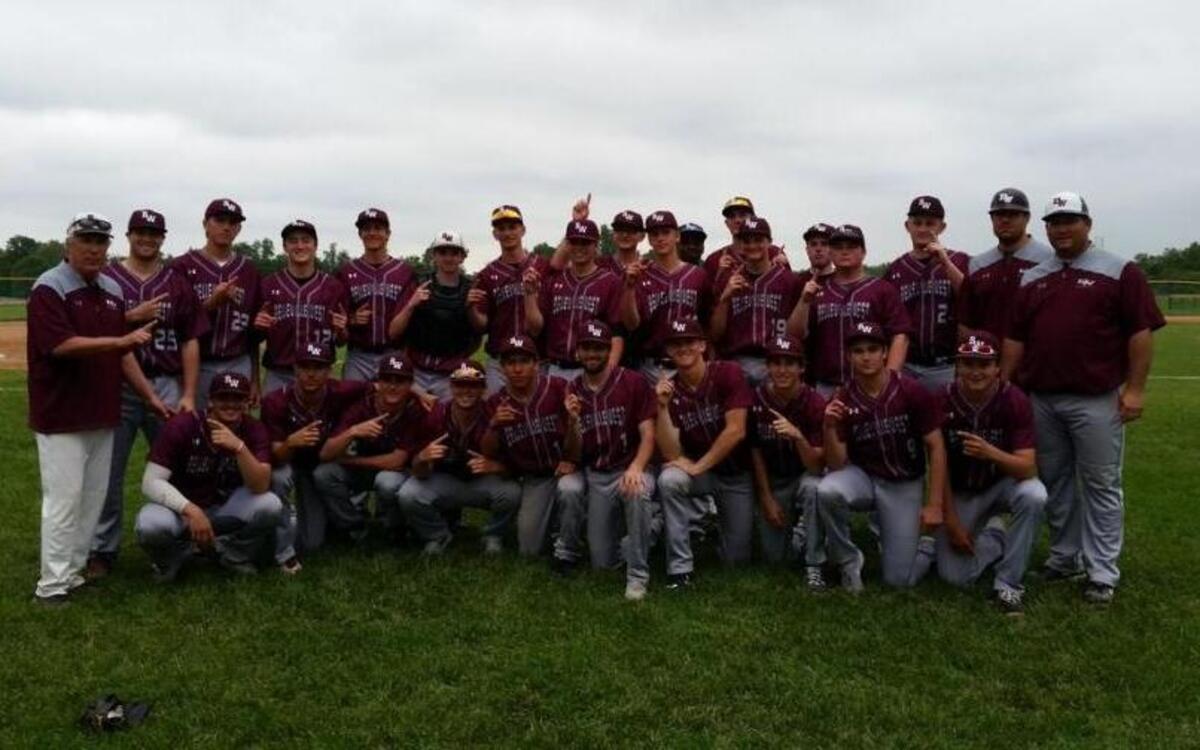 The Belleville West Maroons celebrate their conference clinching win Thurdsday.