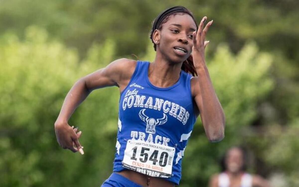 Cahokia senior Mariya Hudson heads to victory in the 400-meter dash as she closed out her high school career with her sixth individual state championship.