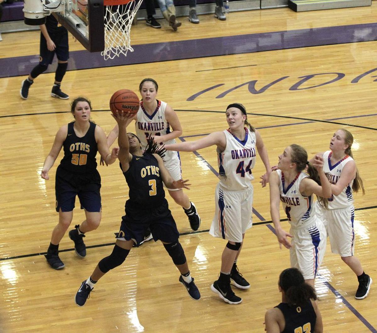 O’Fallon’s Kayla Gordon goes for a reverse layup in the Panthers’ 43-20 win on Friday over Okawville in the semi-final of the Mascoutah Invitational.