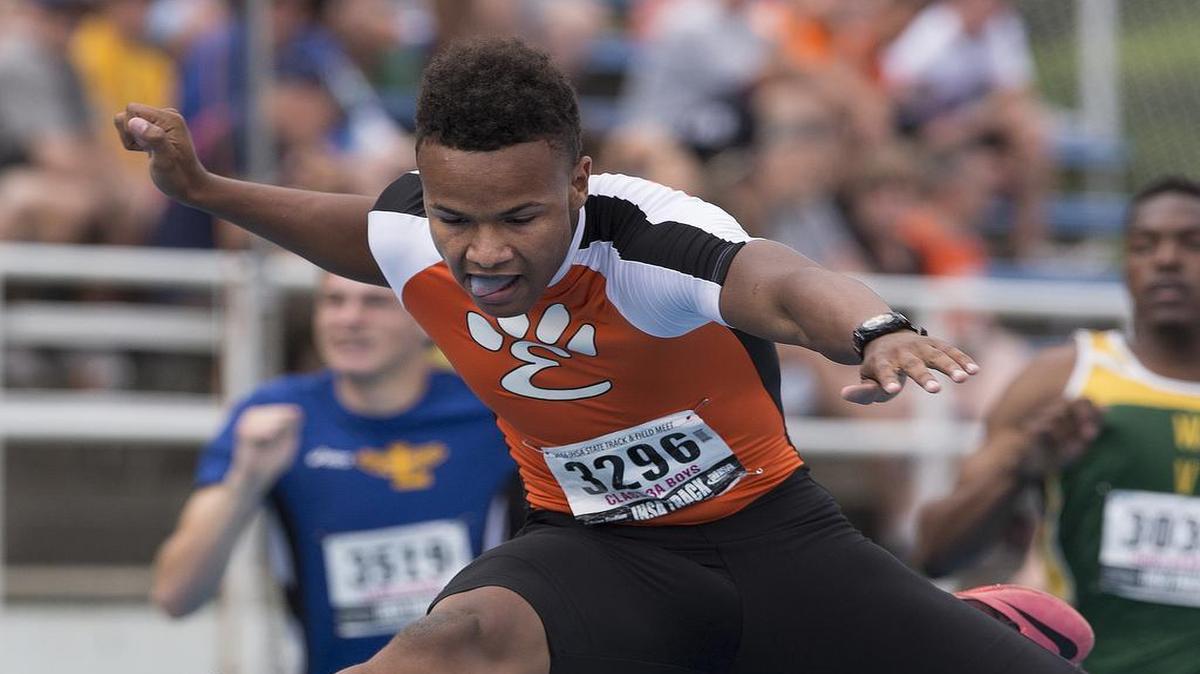 Edwardsville’s Travis Anderson competes in the Class 3A 300-meter intermediate hurdles preliminary race at the state track and field meet on Friday at O’Brien Stadium in Charleston. See a gallery of photographs from Friday’s events at bnd.com.